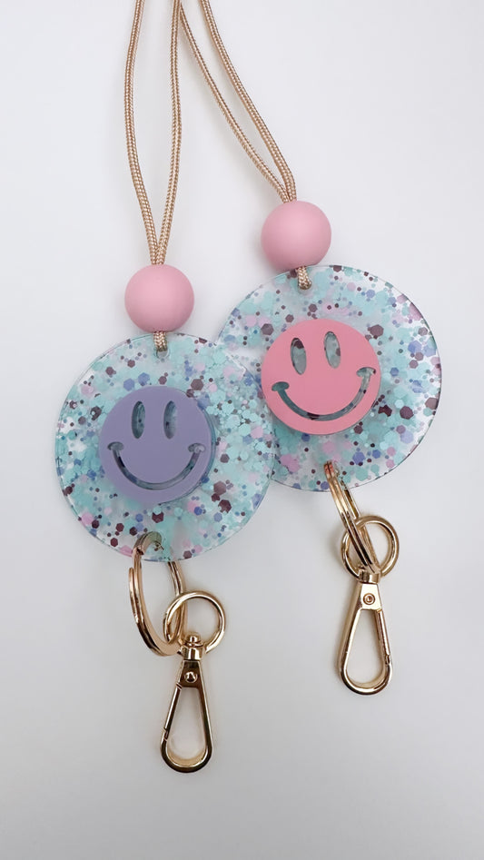 colorful purple & pink confetti acrylic smiley lanyard