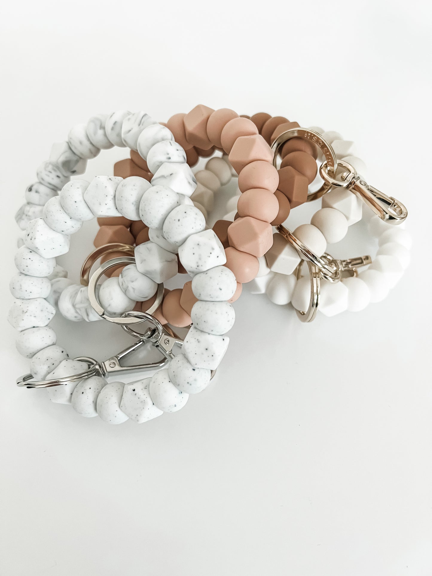 solid tone bracelet keychain in blush with small hexagons
