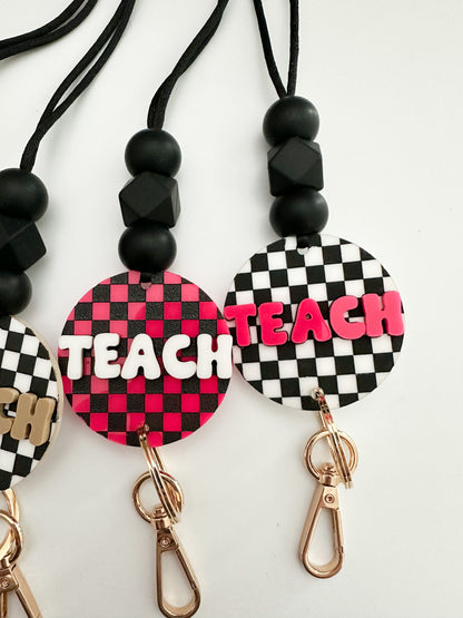 TEACH checkerboard lanyard (multiple color options)