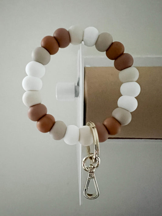 hazelnut, sandstone, caramel brown and white bracelet keychain