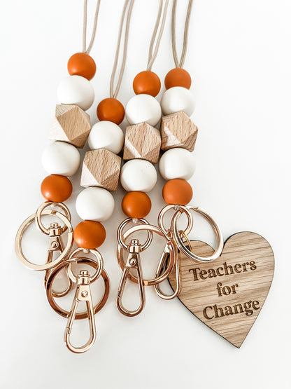 Teachers for Change donation lanyard — orange, ivory + wood teacher lanyard