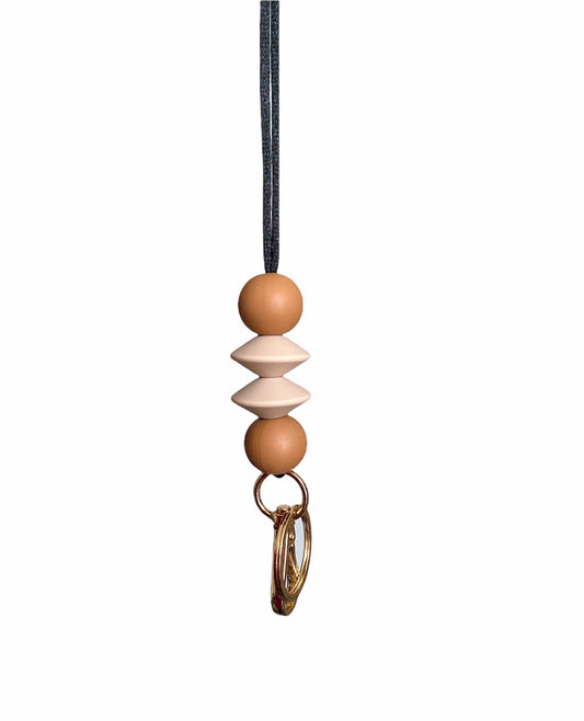 hazelnut + oat flying saucer ready to ship lanyard | basics collection