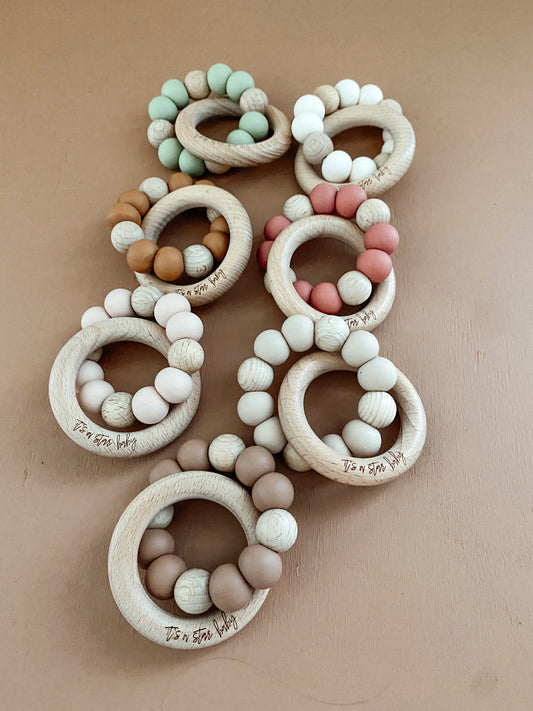muted tones + wood // teethers