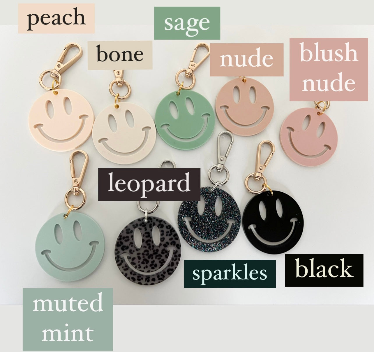 muted smiley charms