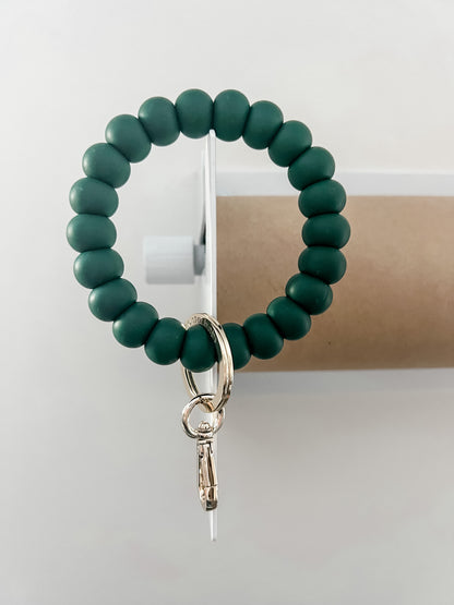 solid tone bracelet keychain in hunter green
