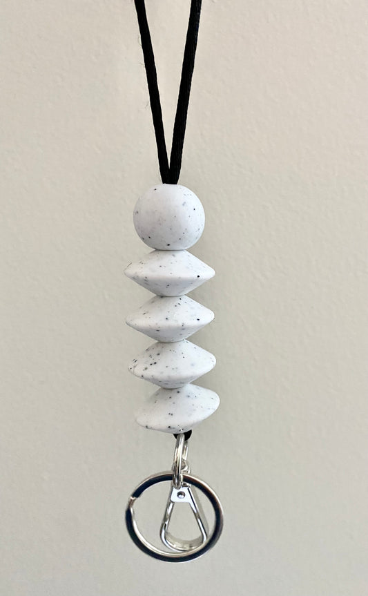 speckled white flying saucer lanyard