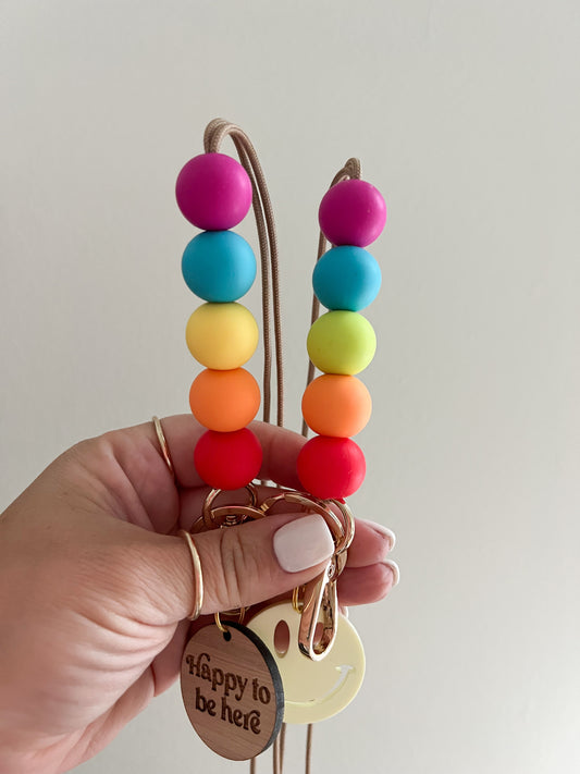 good life round neon lanyard with happy to be here & yellow smiley charms