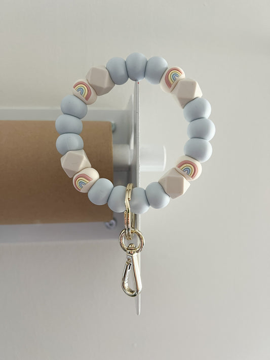 ice blue and muted rainbows bracelet keychain