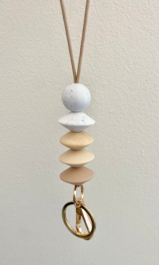 neutral flying saucer lanyard